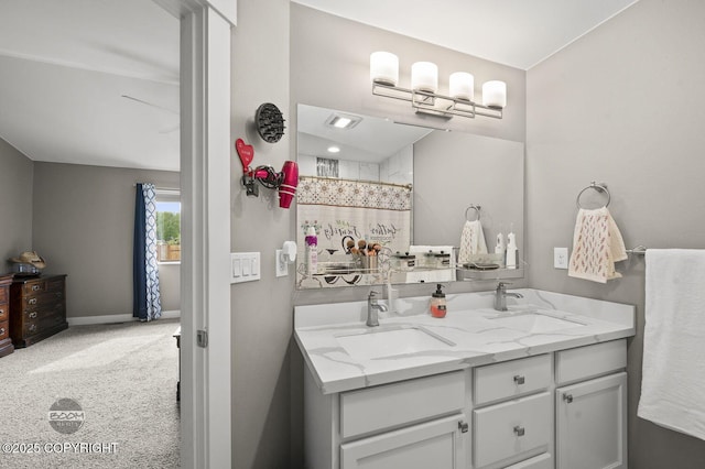 1169 W Trumpeter Swan Dr, Wasilla, AK 99623 - full bathroom with double vanity, a shower with curtain, and baseboards