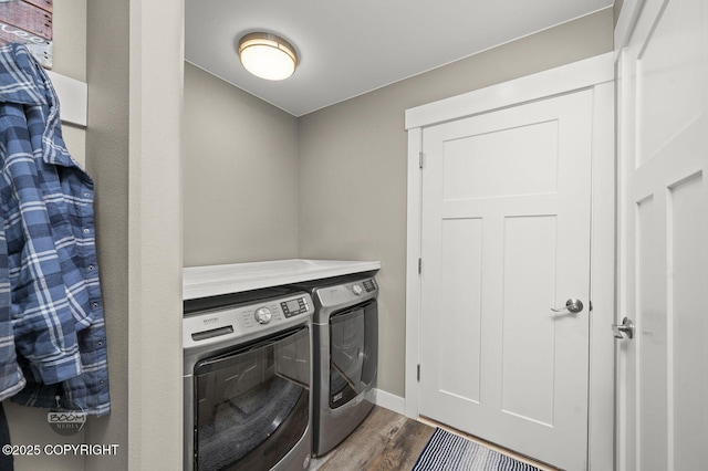 1169 W Trumpeter Swan Dr, Wasilla, AK 99623 - washroom featuring separate washer and dryer, wood finished floors, and baseboards