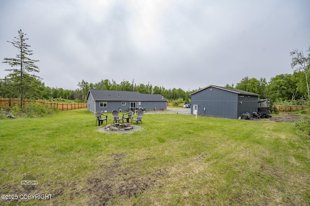 1169 W Trumpeter Swan Dr, Wasilla, AK 99623 - view of yard featuring an outdoor fire pit