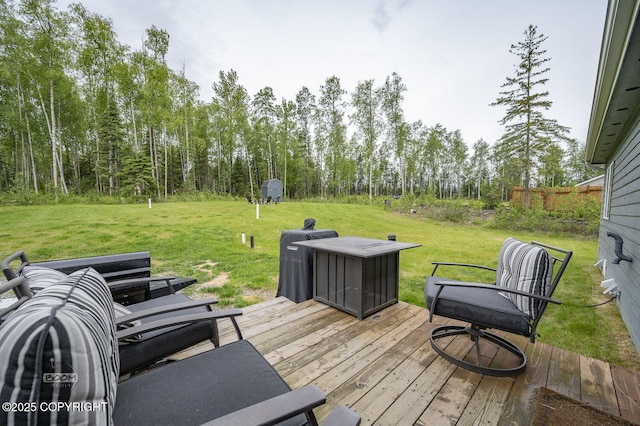 1169 W Trumpeter Swan Dr, Wasilla, AK 99623 - wooden terrace featuring a lawn