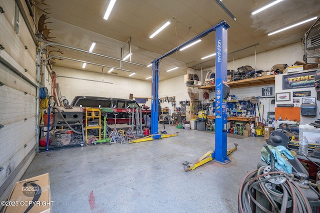 1169 W Trumpeter Swan Dr, Wasilla, AK 99623 - garage featuring a workshop area