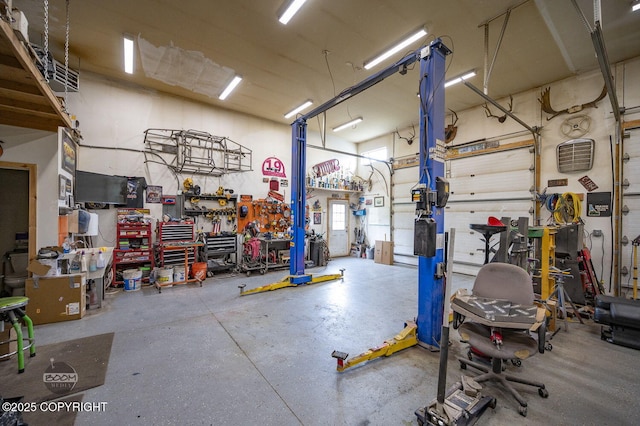 1169 W Trumpeter Swan Dr, Wasilla, AK 99623 - garage with a workshop area