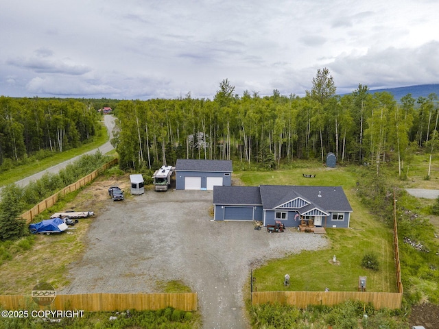 1169 W Trumpeter Swan Dr, Wasilla, AK 99623 - aerial view of property and surrounding area with a heavily wooded area