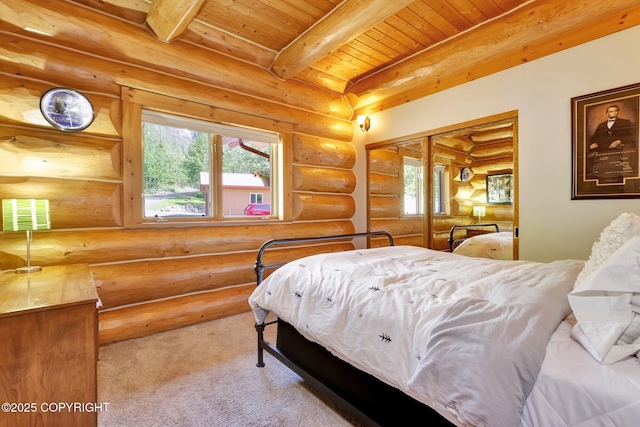 3108 Misty Mountain Rd, Eagle River, AK 99577 - bedroom featuring a wooden ceiling with exposed beams, log walls, and carpet floors