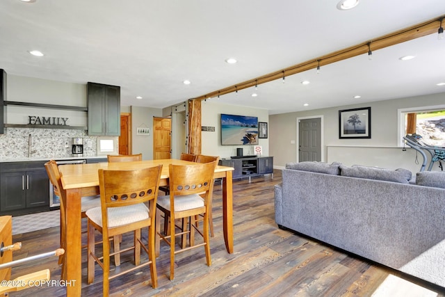 3108 Misty Mountain Rd, Eagle River, AK 99577 - dining area with wood finished floors, recessed lighting, and bar