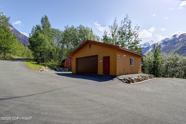 3108 Misty Mountain Rd, Eagle River, AK 99577 - detached garage featuring a mountain view