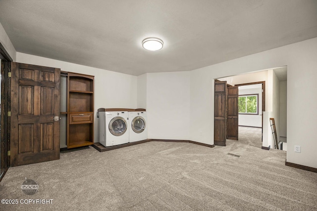 10010 Colville St, Eagle River, AK 99577 - washroom with washing machine and clothes dryer and carpet