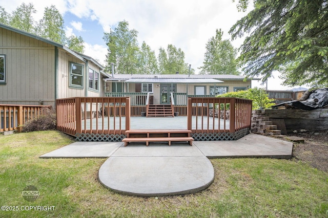 10010 Colville St, Eagle River, AK 99577 - back of property with a patio area and a wooden deck