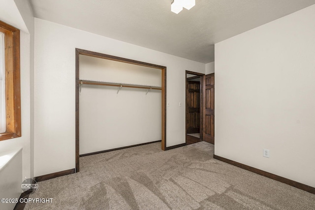 10010 Colville St, Eagle River, AK 99577 - unfurnished bedroom featuring carpet flooring and a closet