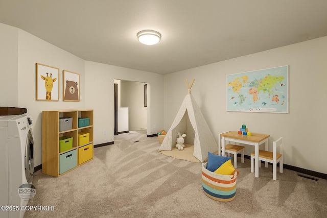 10010 Colville St, Eagle River, AK 99577 - rec room with washer / clothes dryer and carpet