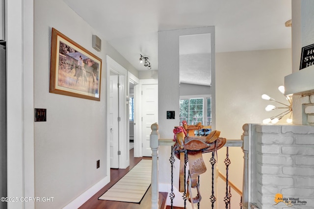 2309 Success Dr, Anchorage, AK 99504 - corridor with baseboards and wood finished floors
