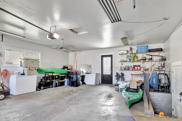 2309 Success Dr, Anchorage, AK 99504 - garage featuring a garage door opener