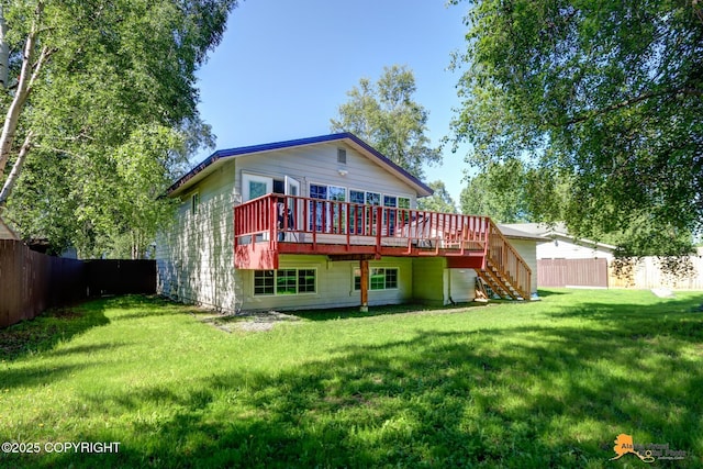 2309 Success Dr, Anchorage, AK 99504 - back of house with stairway, a wooden deck, and a fenced backyard