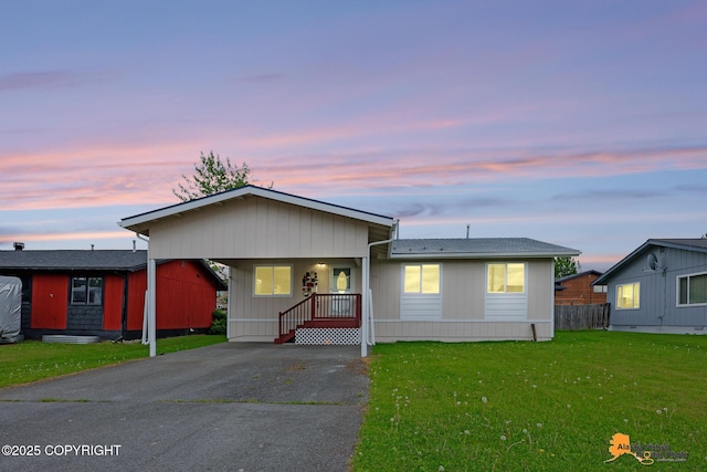 8630 E 17th Ave, Anchorage, AK 99504 - manufactured / mobile home featuring driveway and an attached carport