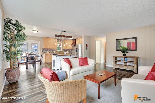 8630 E 17th Ave, Anchorage, AK 99504 - living room featuring dark wood finished floors and a textured ceiling