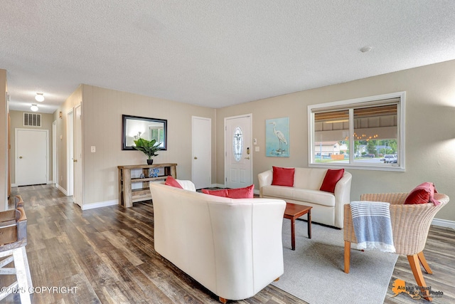 8630 E 17th Ave, Anchorage, AK 99504 - living room featuring a textured ceiling and wood finished floors