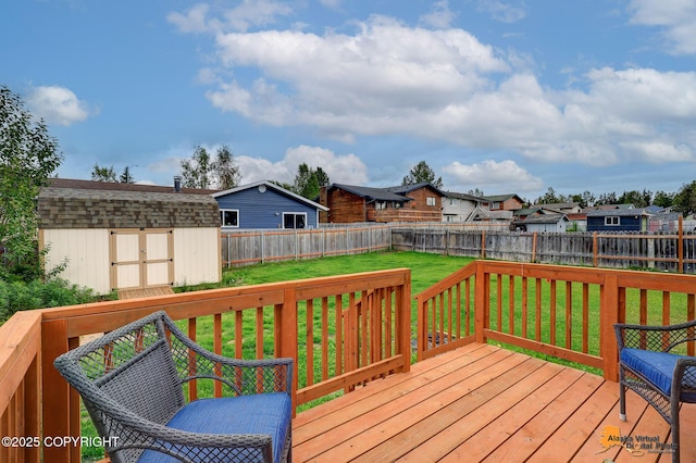 8630 E 17th Ave, Anchorage, AK 99504 - wooden terrace with a shed, a fenced backyard, and a residential view