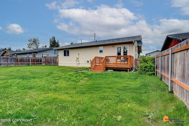 8630 E 17th Ave, Anchorage, AK 99504 - rear view of property featuring a fenced backyard and a wooden deck