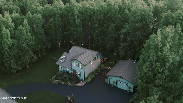 21212 Rock Ptarmigan St, Chugiak, AK 99567 - aerial view of property and surrounding area featuring a heavily wooded area