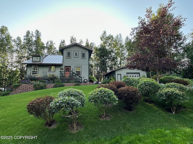 21212 Rock Ptarmigan St, Chugiak, AK 99567 - view of front of property with a front yard and a detached garage