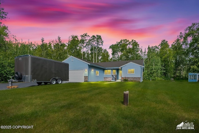 7595 E Breckenridge Dr, Wasilla, AK 99654 - single story home with a garage and a lawn