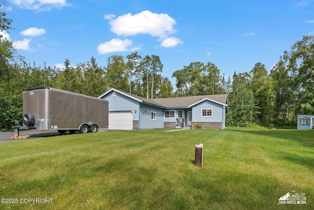 7595 E Breckenridge Dr, Wasilla, AK 99654 - view of front of home with a garage and a front lawn