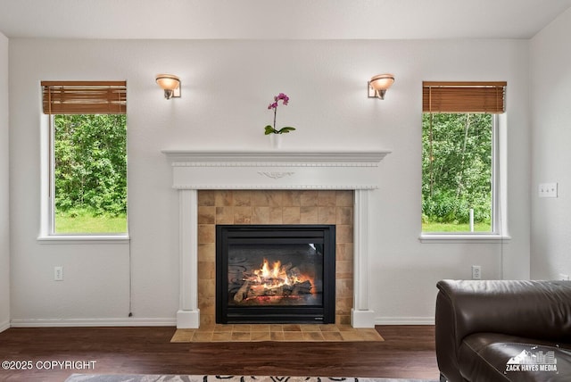 7595 E Breckenridge Dr, Wasilla, AK 99654 - detailed view of wood finished floors and a tiled fireplace