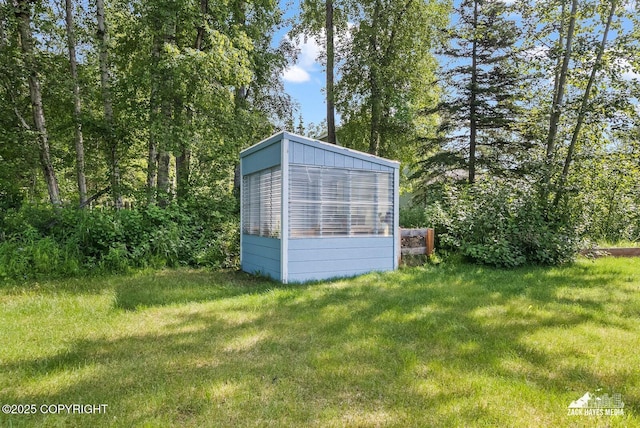 7595 E Breckenridge Dr, Wasilla, AK 99654 - view of grassy yard with an outdoor structure