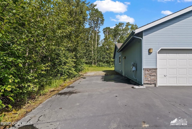 7595 E Breckenridge Dr, Wasilla, AK 99654 - view of property exterior with stone siding