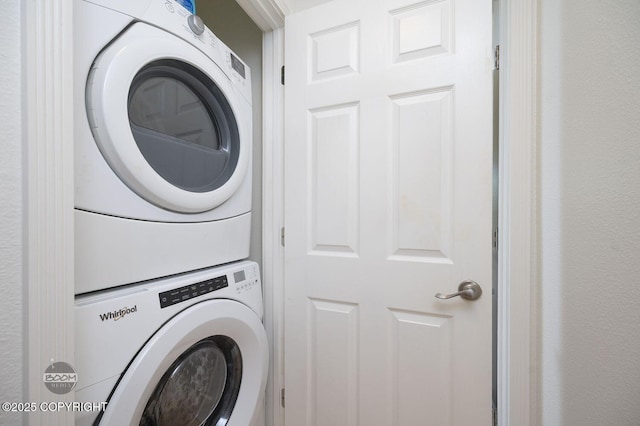 1675 Sitka St # 102, Anchorage, AK 99501 - laundry room with stacked washer and clothes dryer