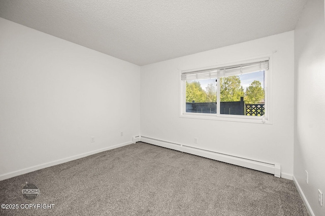 1675 Sitka St # 102, Anchorage, AK 99501 - empty room featuring a baseboard radiator, carpet flooring, and a textured ceiling