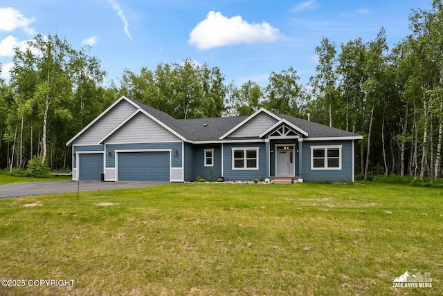 8028 E Yarn Spinner Cir, Palmer, AK 99645 - ranch-style house with a garage, driveway, a front lawn, and a shingled roof