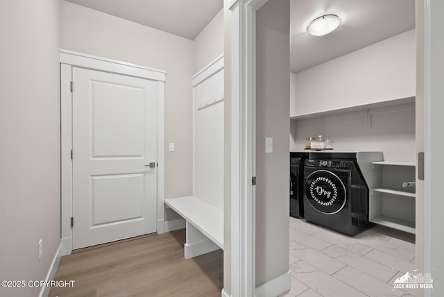 8028 E Yarn Spinner Cir, Palmer, AK 99645 - washroom featuring washer and dryer and light marble finish floors