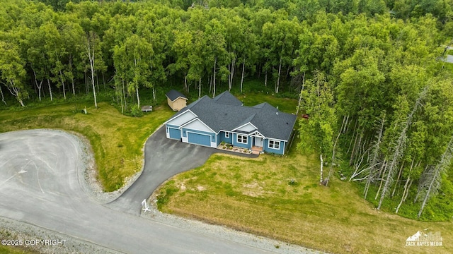 8028 E Yarn Spinner Cir, Palmer, AK 99645 - view of subject property featuring a heavily wooded area