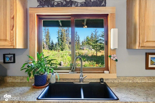 71252 Siri, Anchor Point, AK 99556 - kitchen featuring a sink and light brown cabinetry