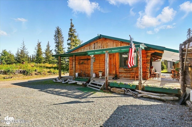 71252 Siri, Anchor Point, AK 99556 - log-style house featuring log exterior and board and batten siding