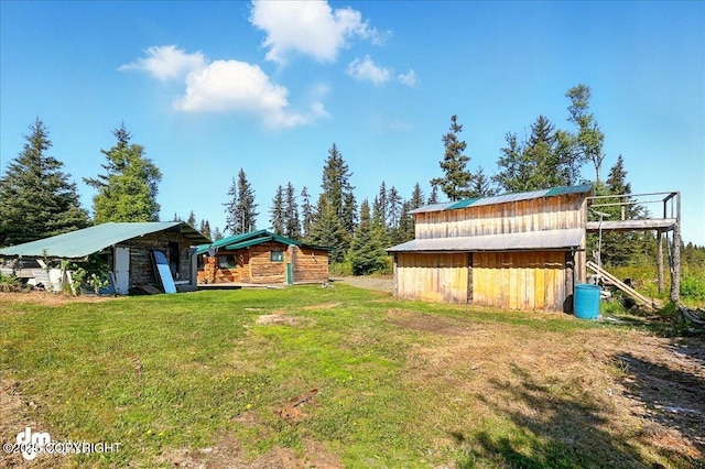 71252 Siri, Anchor Point, AK 99556 - view of grassy yard with an outdoor structure
