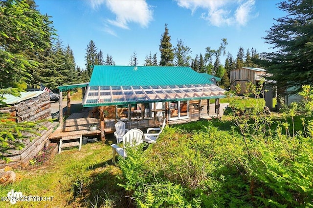 71252 Siri, Anchor Point, AK 99556 - back of property with a metal roof and a storage shed