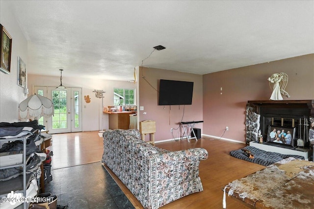 701 N Luke St, Wasilla, AK 99654 - living area with a fireplace and wood finished floors