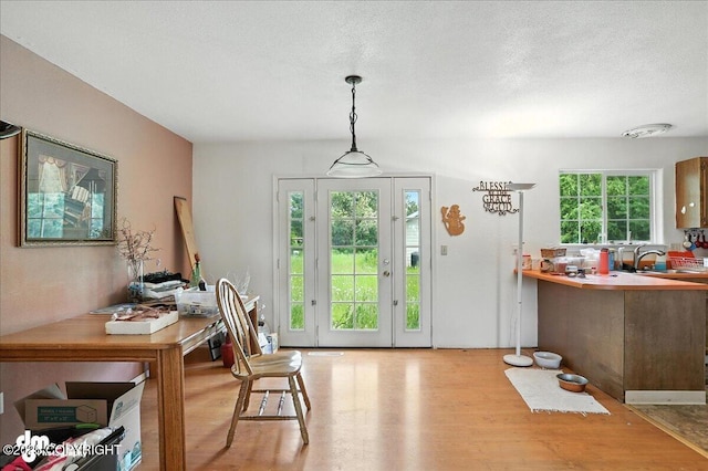 701 N Luke St, Wasilla, AK 99654 - foyer featuring wood finished floors and a textured ceiling