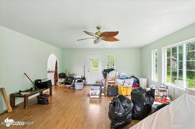 701 N Luke St, Wasilla, AK 99654 - bedroom with wood finished floors, arched walkways, and ceiling fan