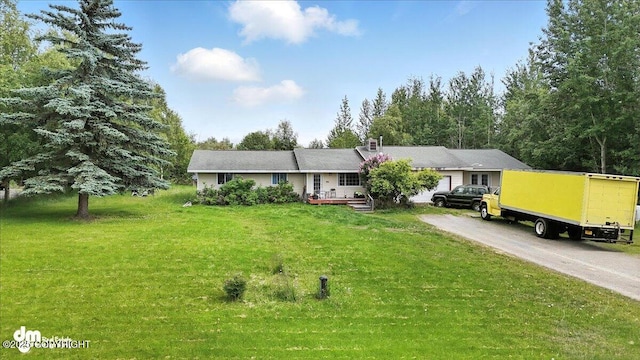 701 N Luke St, Wasilla, AK 99654 - view of front of home featuring a front yard and concrete driveway
