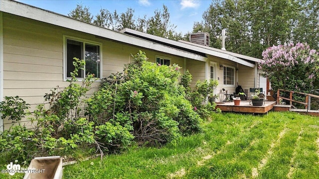 701 N Luke St, Wasilla, AK 99654 - view of grassy yard with a wooden deck