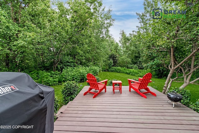 11240 E Equestrian St, Palmer, AK 99645 - wooden terrace with area for grilling and a lawn