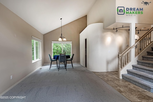 11240 E Equestrian St, Palmer, AK 99645 - dining area featuring high vaulted ceiling, stairway, and carpet