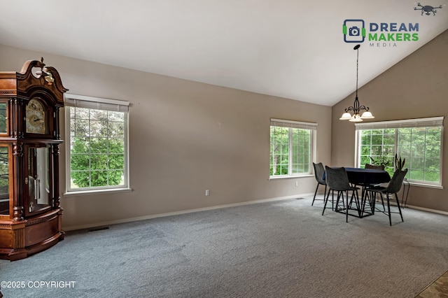 11240 E Equestrian St, Palmer, AK 99645 - dining area featuring carpet floors, a chandelier, and lofted ceiling