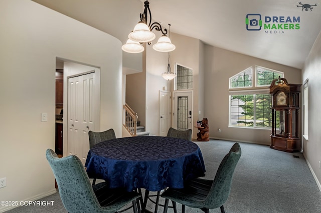 11240 E Equestrian St, Palmer, AK 99645 - carpeted dining area featuring stairway and high vaulted ceiling