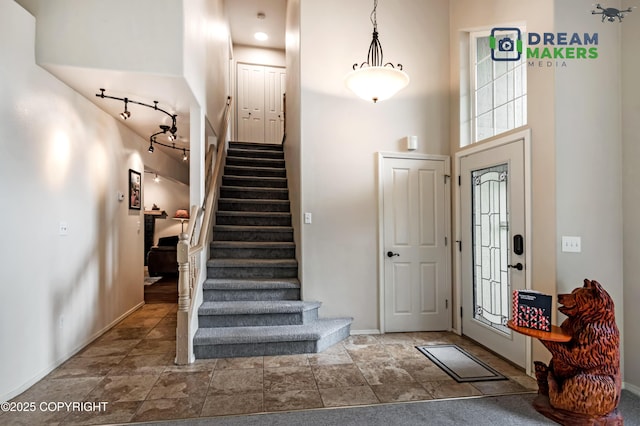 11240 E Equestrian St, Palmer, AK 99645 - entryway with stairway and track lighting