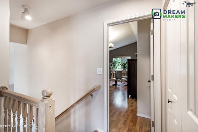 11240 E Equestrian St, Palmer, AK 99645 - corridor featuring an upstairs landing, wood finished floors, and lofted ceiling