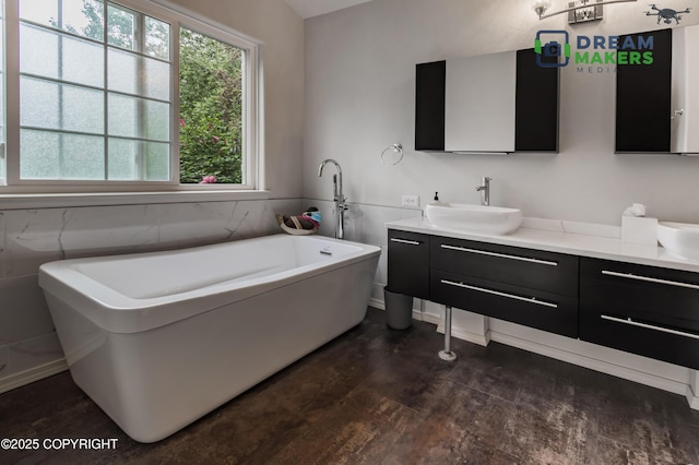 11240 E Equestrian St, Palmer, AK 99645 - full bathroom featuring double vanity, a soaking tub, wainscoting, and tile walls